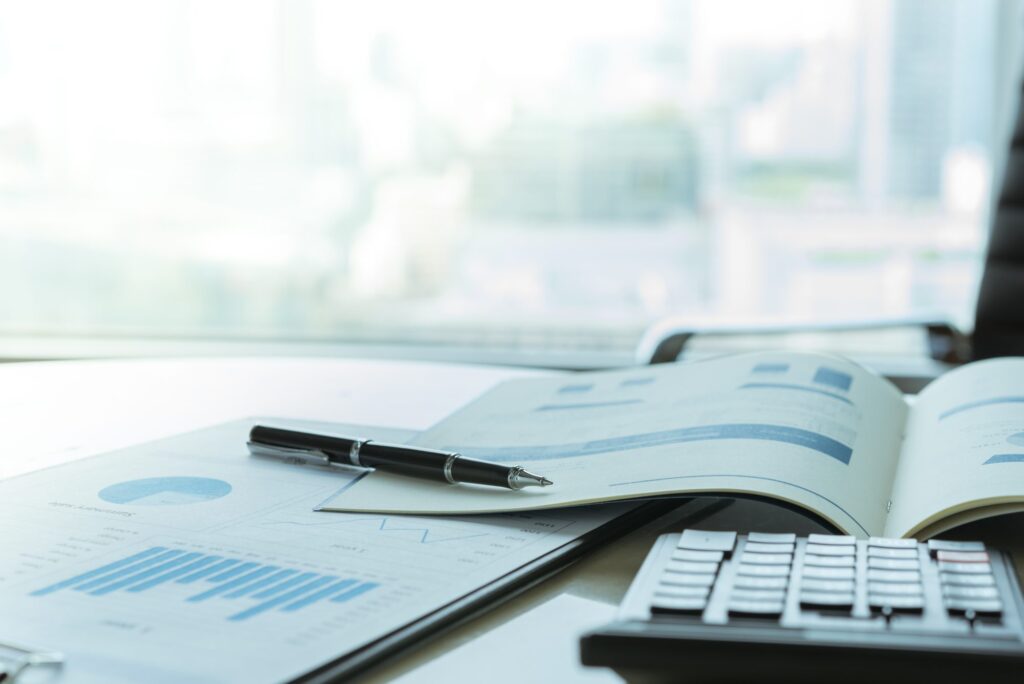 Annual report documents on a desk